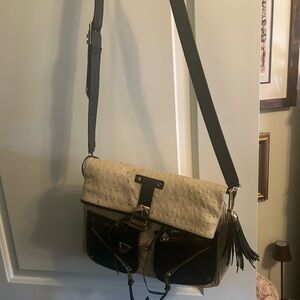 Rebecca Minkoff Black and Tan Crossbody Bag with Flap Closure